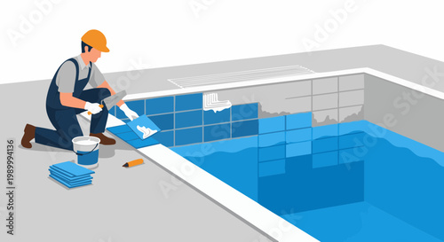 Construction worker installing blue tiles in swimming pool during renovation