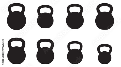 Black kettlebell weights in a row.