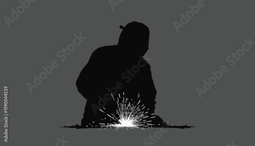 silhouette of a welder on working area