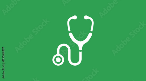 A stethoscope lies on a green background for health checks.