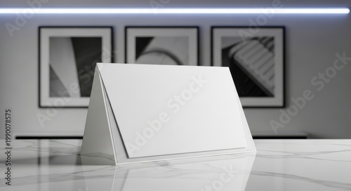 Folded Blank Invitation Card Displaying Clean White Space on a Marble Surface