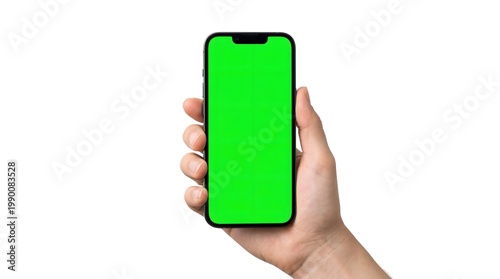 Hand holding a smartphone with a green screen display.