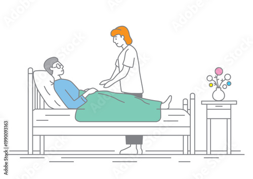 ベッドで介助を受ける高齢男性と介護士のシーン