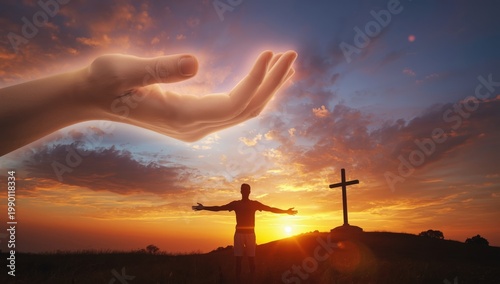 Divine support and crucifix against a sunset