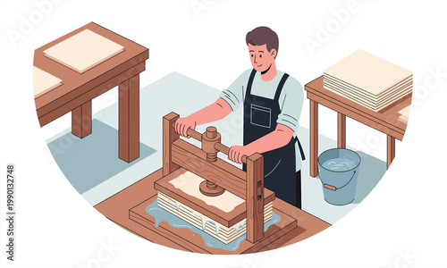 A person producing paper using a manual press in a workshop