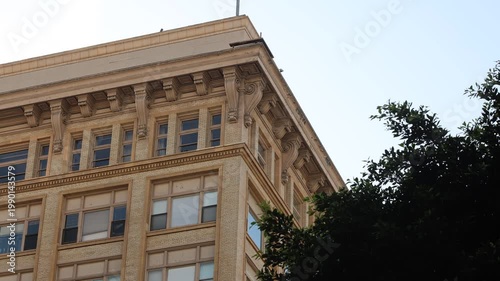 Old Office Building Facade At Dawn With Tree