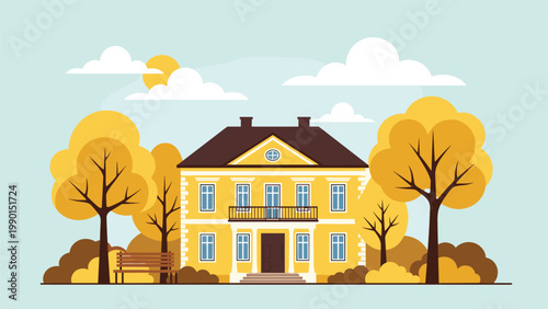Elegant two-story yellow building with a balcony situated in a park with large autumn trees and a park bench under a blue sky.