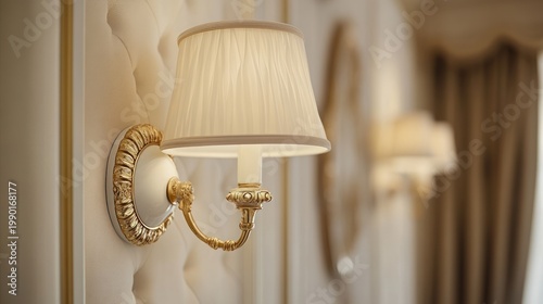 Elegant wall sconces illuminating luxurious room