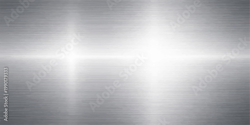 Polished silver brushed metal plate texture with a shiny stainless steel surface and grey industrial aluminum pattern backdrop