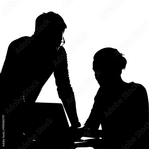 Two individuals collaborating over a laptop in a focused discussion