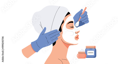 A serene woman wearing a soft white towel receives a professional facial treatment with a white cream mask applied by gloved hands using a small brush.