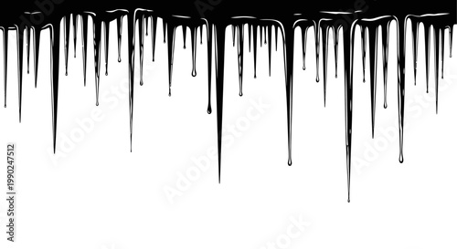 Black paint drips falling down on white background creating a messy abstract pattern