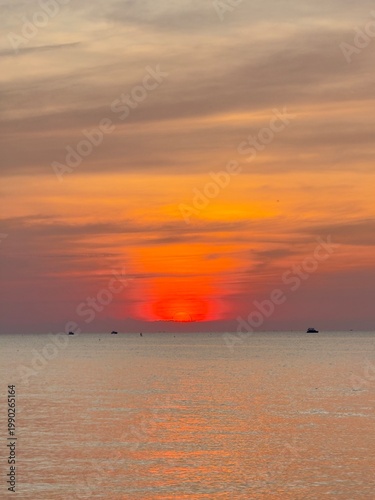 A picture of a sunset, a peaceful natural landscape.