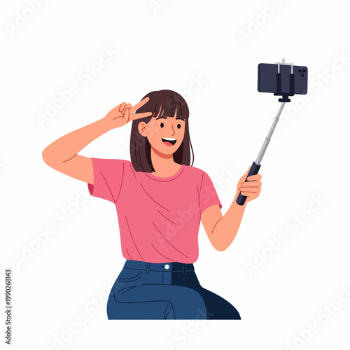 Happy young woman taking a selfie with a smartphone on a stick, making a peace sign and smiling.