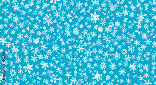 Seamless winter background shows a dense array of white snowflakes of various sizes and shapes over a bright blue surface.