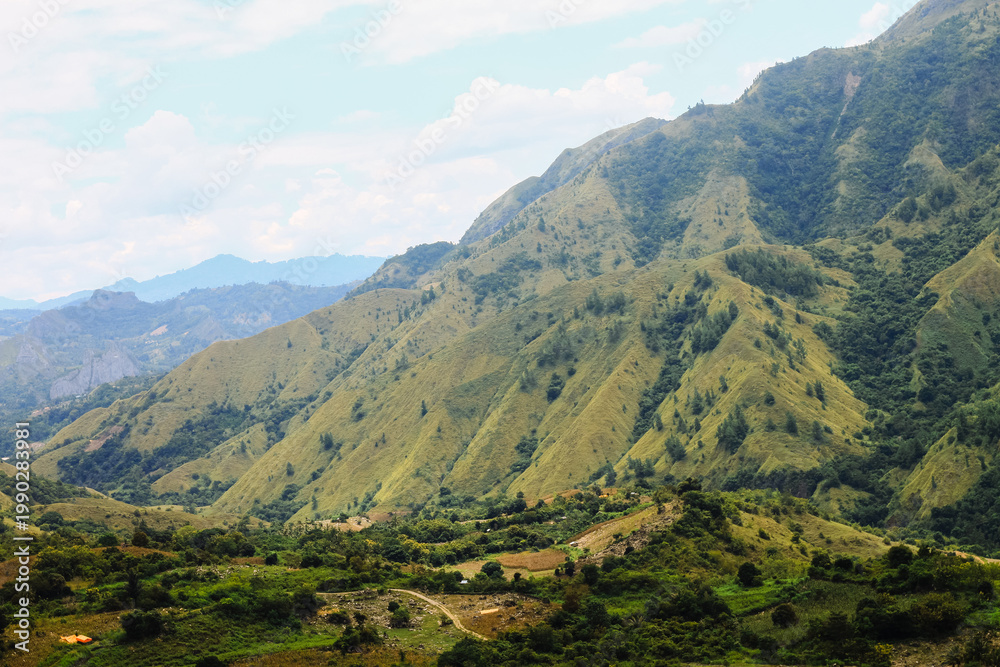 Fototapeta premium Mount Nona: The Striking Curvaceous Peaks of Enrekang, South Sulawesi