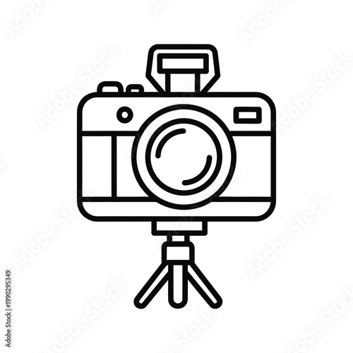 Vintage camera on a tripod with a flash, representing photography, memories, and creative pursuits.