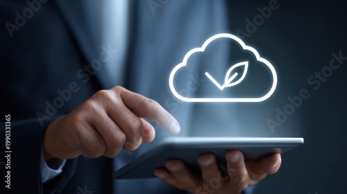 Green cloud computing concept with businessman using tablet, sustainable technology and eco-friendly data storage, environmental corporate responsibility
