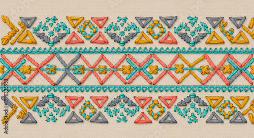 Colorful geometric tribal pattern embroidery detail.