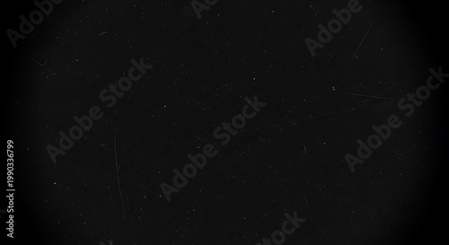 Vintage film texture with dust and scratches overlay on black background