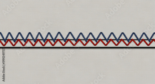 Close up of two zigzag stitches on fabric.