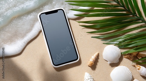 Smartphone on Sandy Beach with Seashells and Tropical Leaves