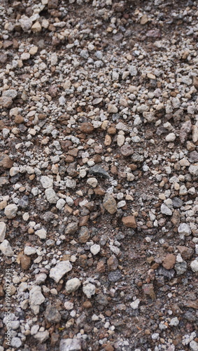 the texture of gravel and mixed with sand