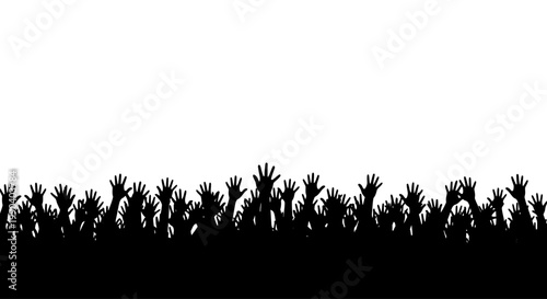 Many people raising hands in unison.