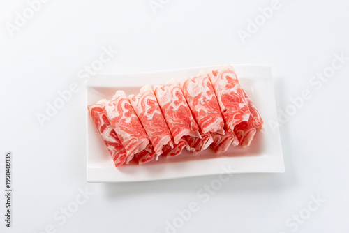 Fotografie White background image of sliced ​​raw mutton