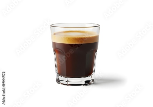 A diminutive glass brimming with darkly inviting espresso rests on a neutral surface, promising a stimulating and invigorating aromatic elixir, ideal for starting the day or enjoying