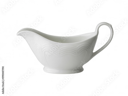 Elegant white ceramic gravy boat with a smooth handle for serving dishes.