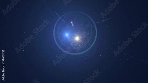 Bright glowing lens flare with circling blue light particles and streaks on a deep navy background