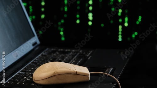 retro laptop with a matrix background