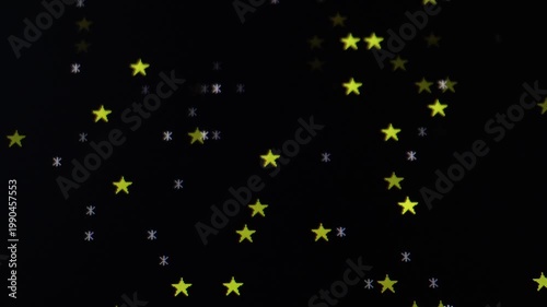 Abstract starfield background with glowing particles on black video horizontal