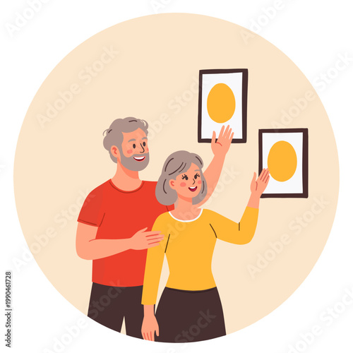 Senior couple smiling while hanging framed art on the wall. Elderly set  