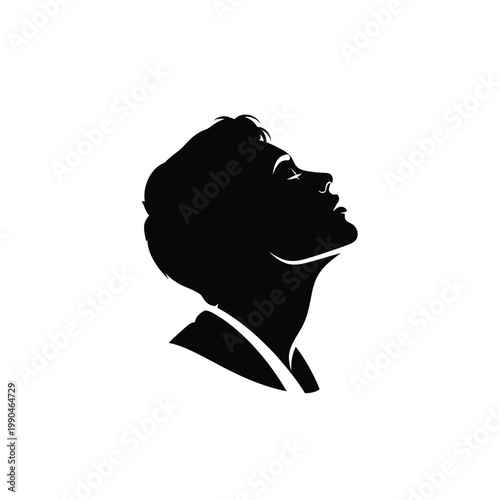 Silhouette of a smiling man.