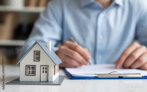 Professional signing documents for new home purchase