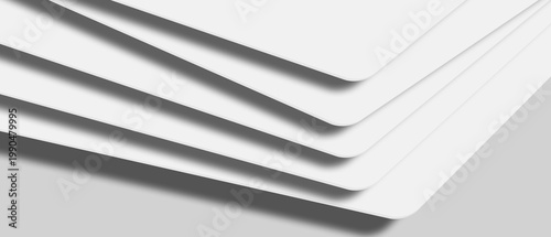  Abstract layered white paper sheets forming clean geometric diagonal lines and shadows