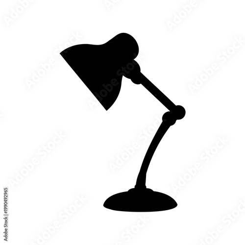 Silhouette of adjustable desk lamp illuminating space with modern design principles