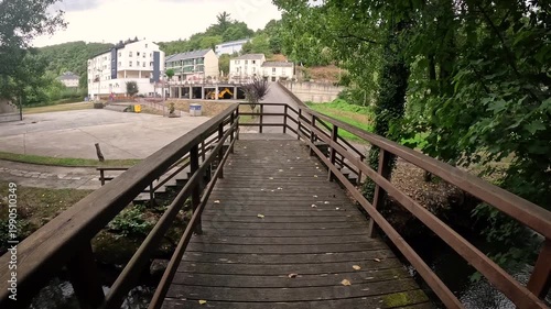 wooden bridge over Sarria river in Samos, comarca of Sarria, province of Lugo, Galicia, Spain