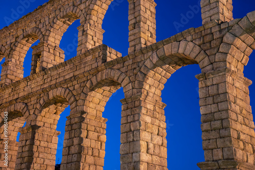 View of the Segovia aqueduct at blue hour, in Castilla y Leon.