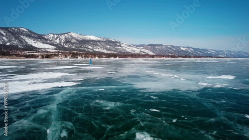 Flight over the ice of Lake Baikal