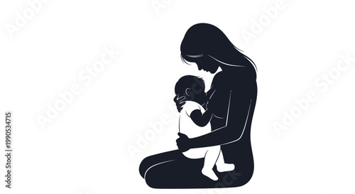Silhouette of a mother breastfeeding her infant child.