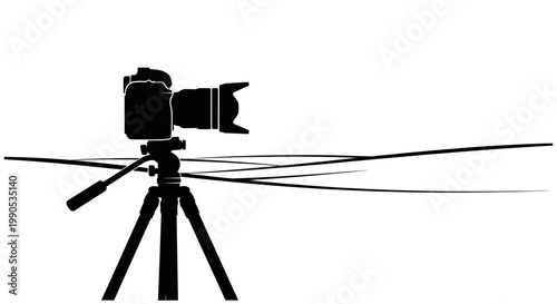 Professional Camera on Tripod Ready for Action.