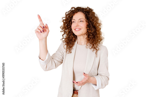 Woman with curly hair pointing and touching a virtual screen, interacting with future technology on transparent background