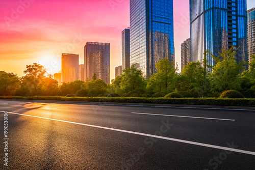Urban Sunset with Modern Skyscrapers and Empty Road