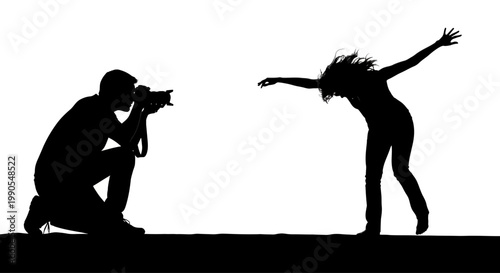 Silhouette of a photographer capturing a dancers pose.