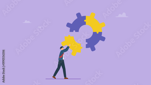 Businessman put the final peace of puzzle which forms a gear. Business completion concept.