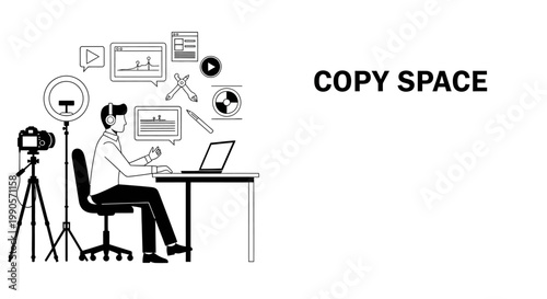 Man creating content with camera and laptop.