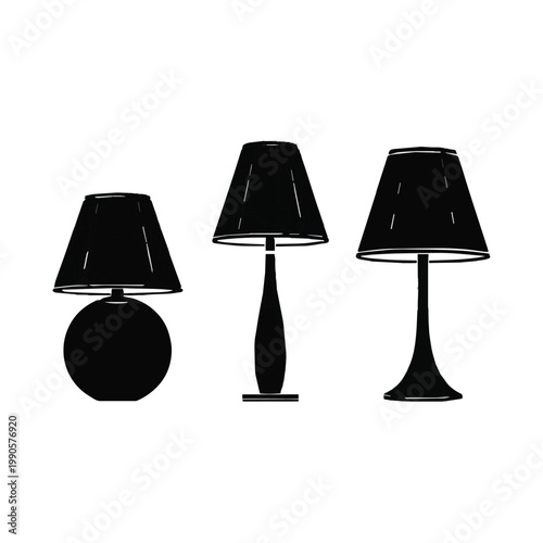 Three black table lamps with different shapes and designs